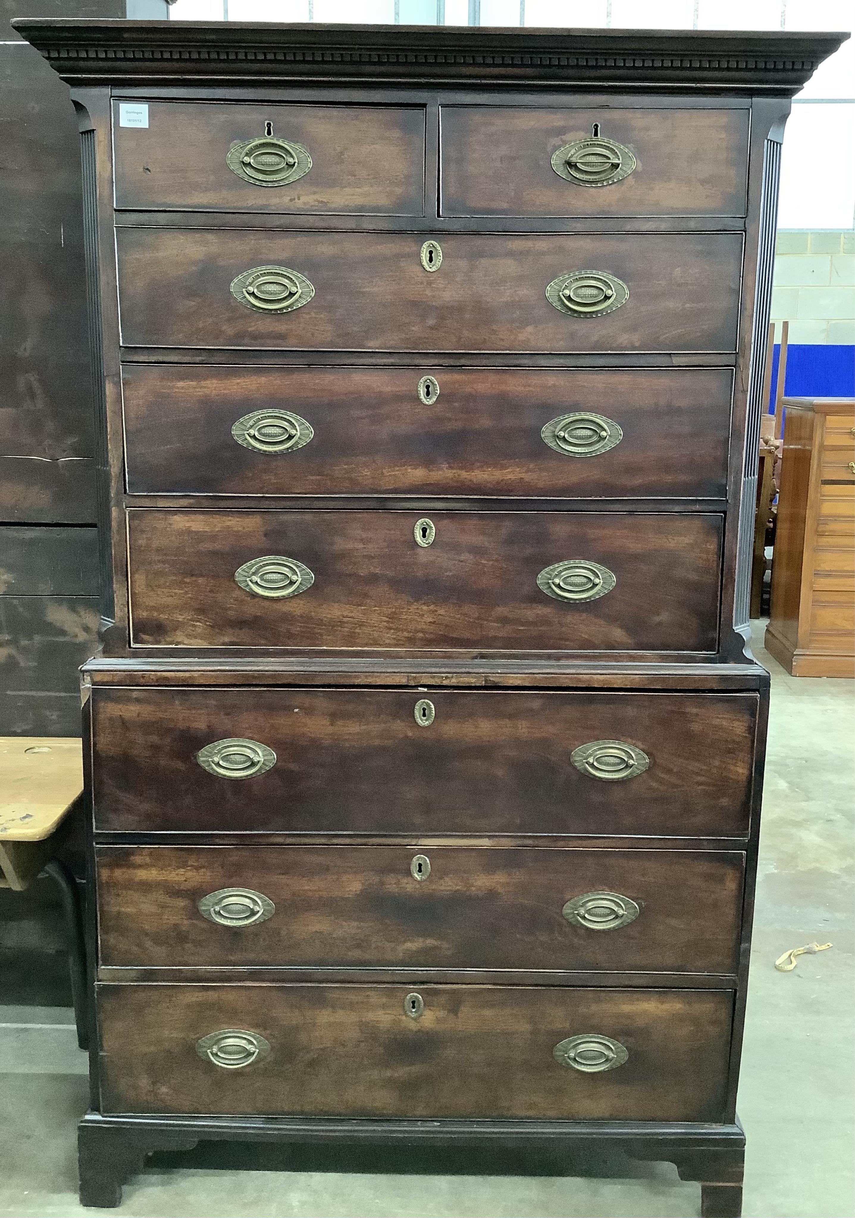A George III mahogany secretaire chest on chest, width 117cm, depth 56cm, height 188cm